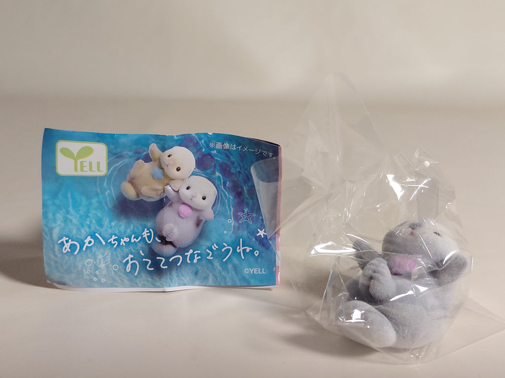 Sea otter Otete tsunagone Mascot - Pink