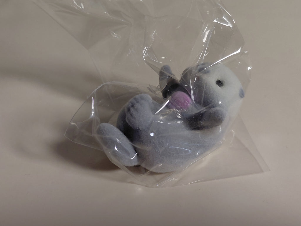 Sea otter Otete tsunagone Mascot - Pink