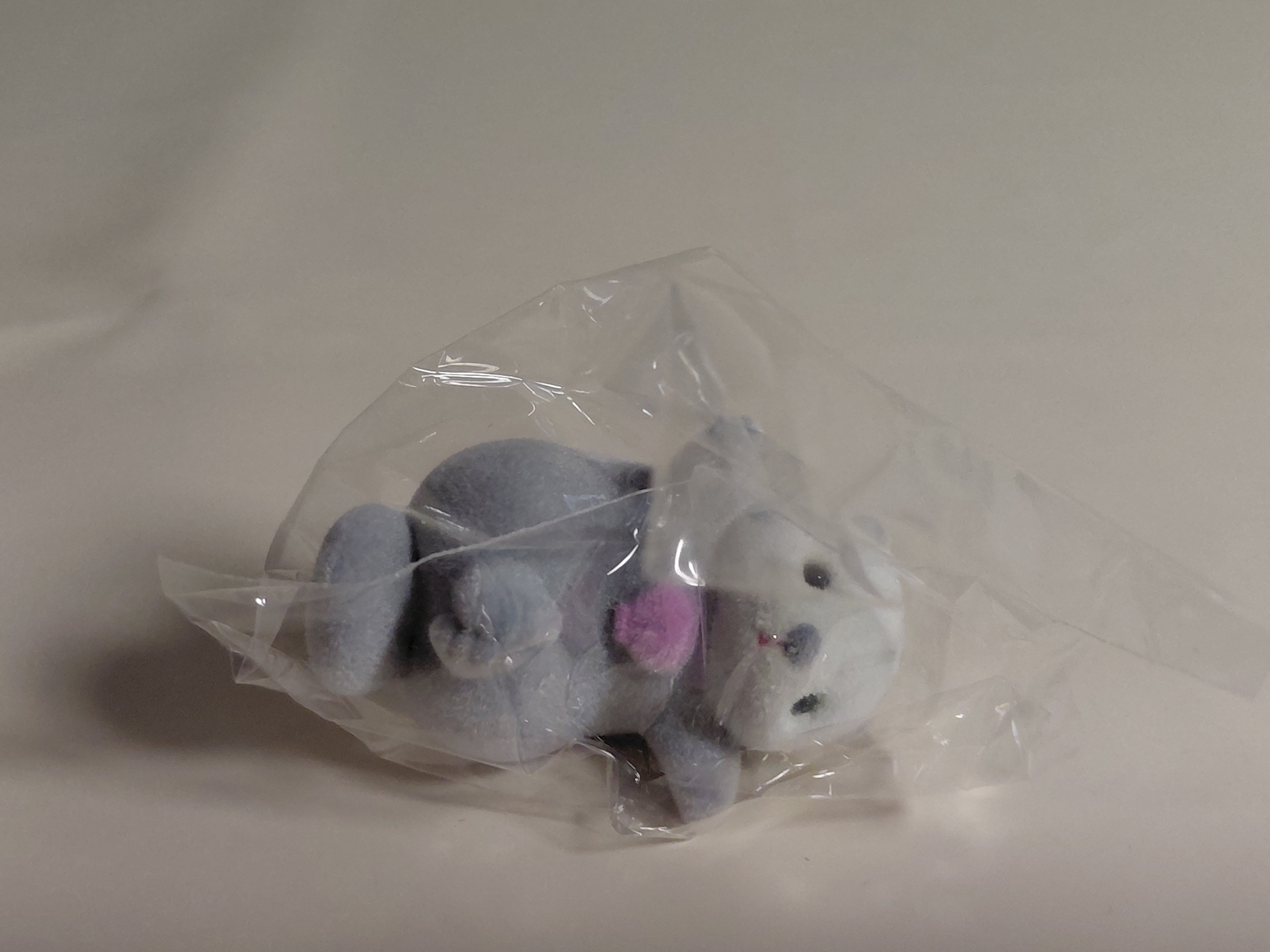 Sea otter Otete tsunagone Mascot - Pink