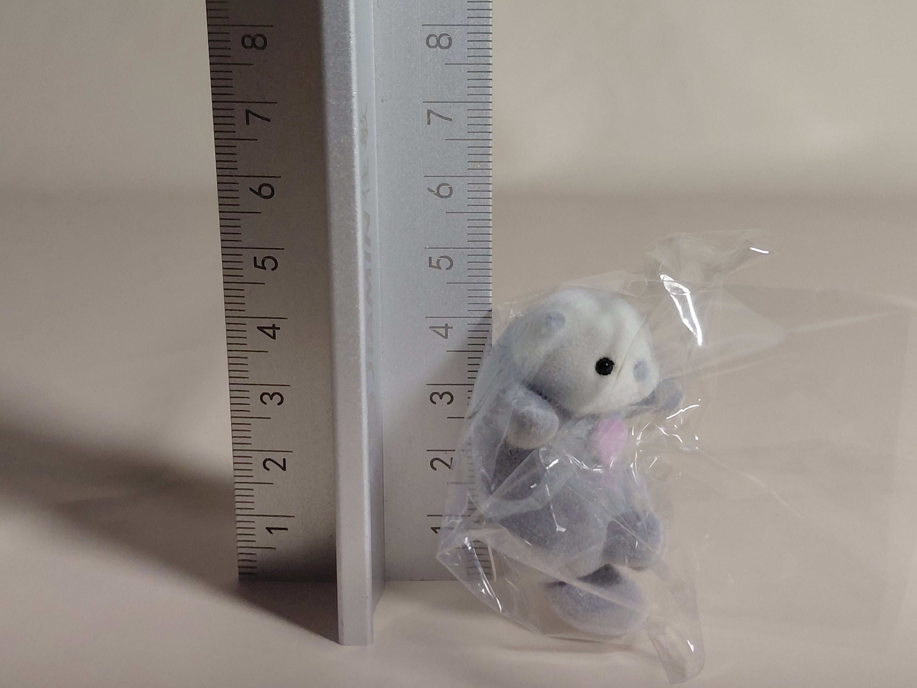 Sea otter Otete tsunagone Mascot - Pink