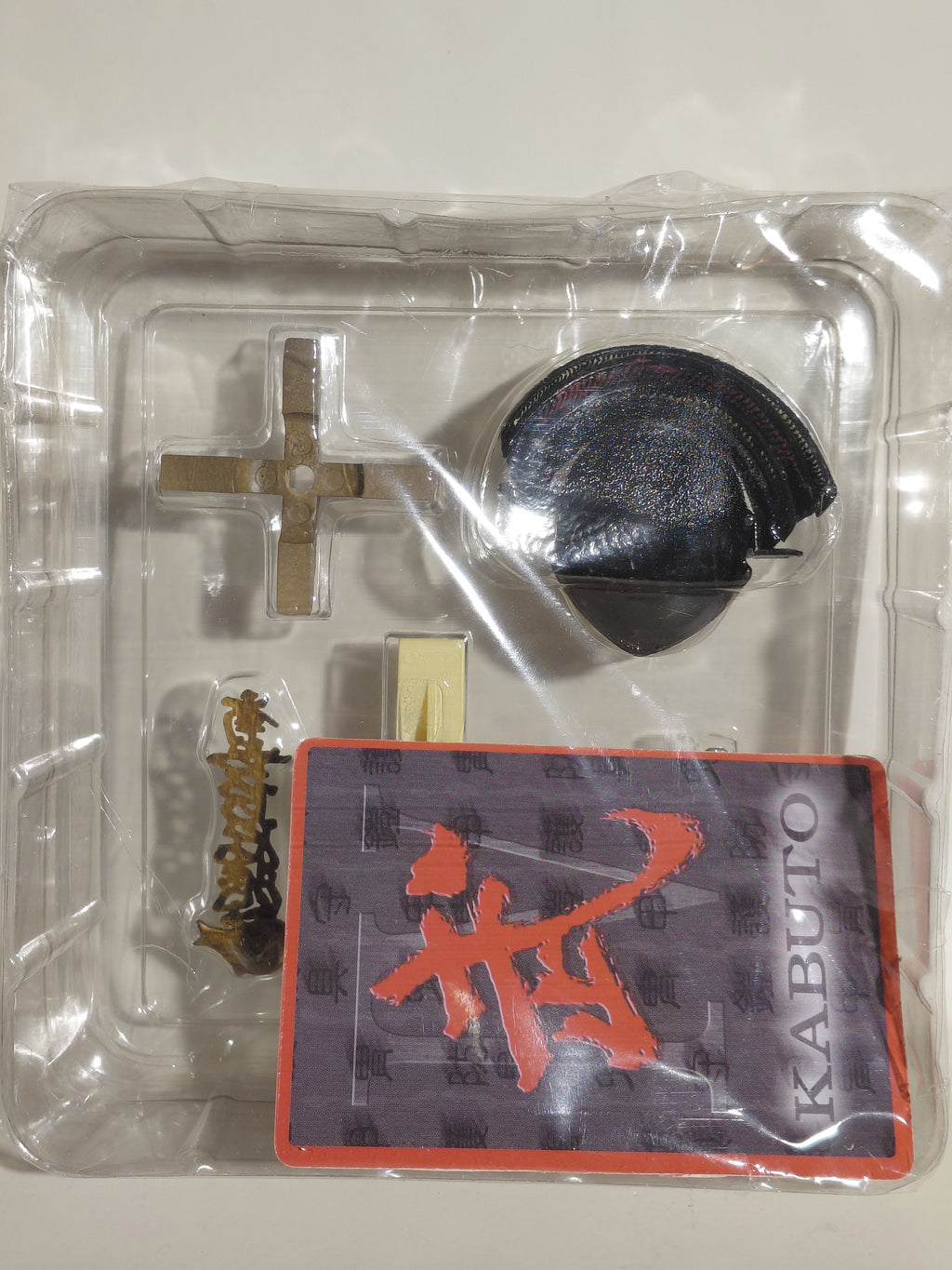 Mononofu Vol. 4: World Helmet Series (1/10 scale)M0407 — Mori Ranmaru's Iron Black Lacquer Six-Plate Ribbed Helmet